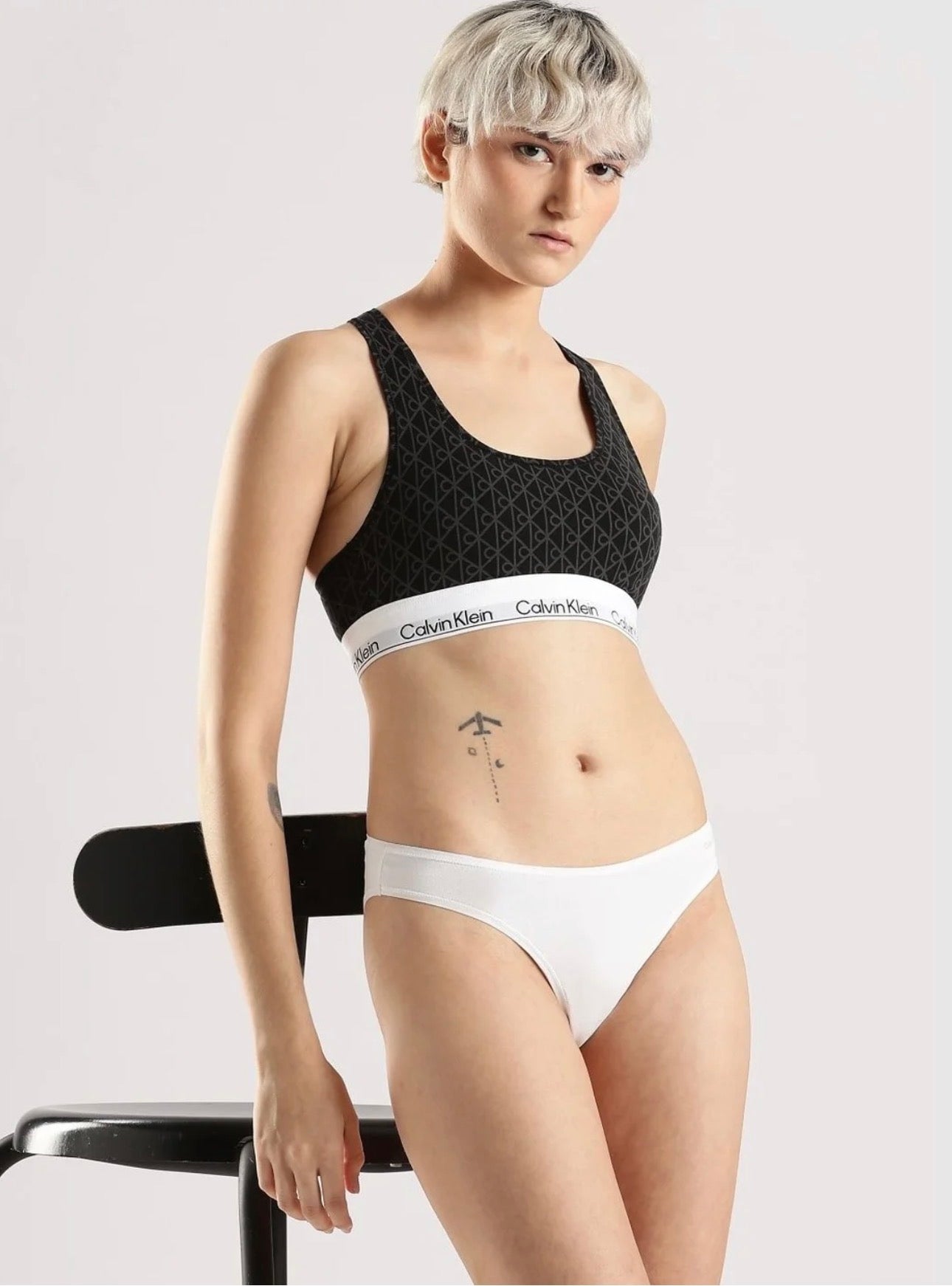 Calvin Klein CK One All-Over Logo Sports Bra – Black