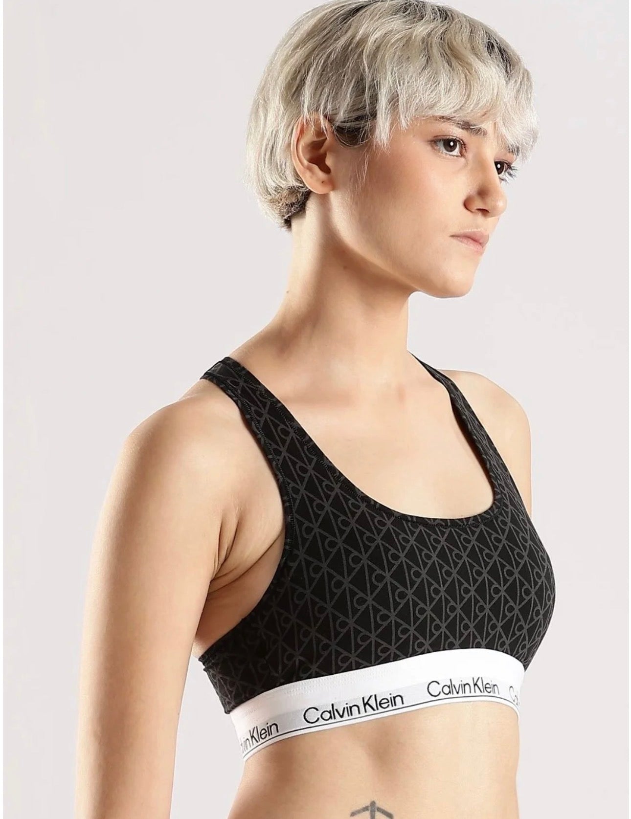 Calvin Klein CK One All-Over Logo Sports Bra – Black