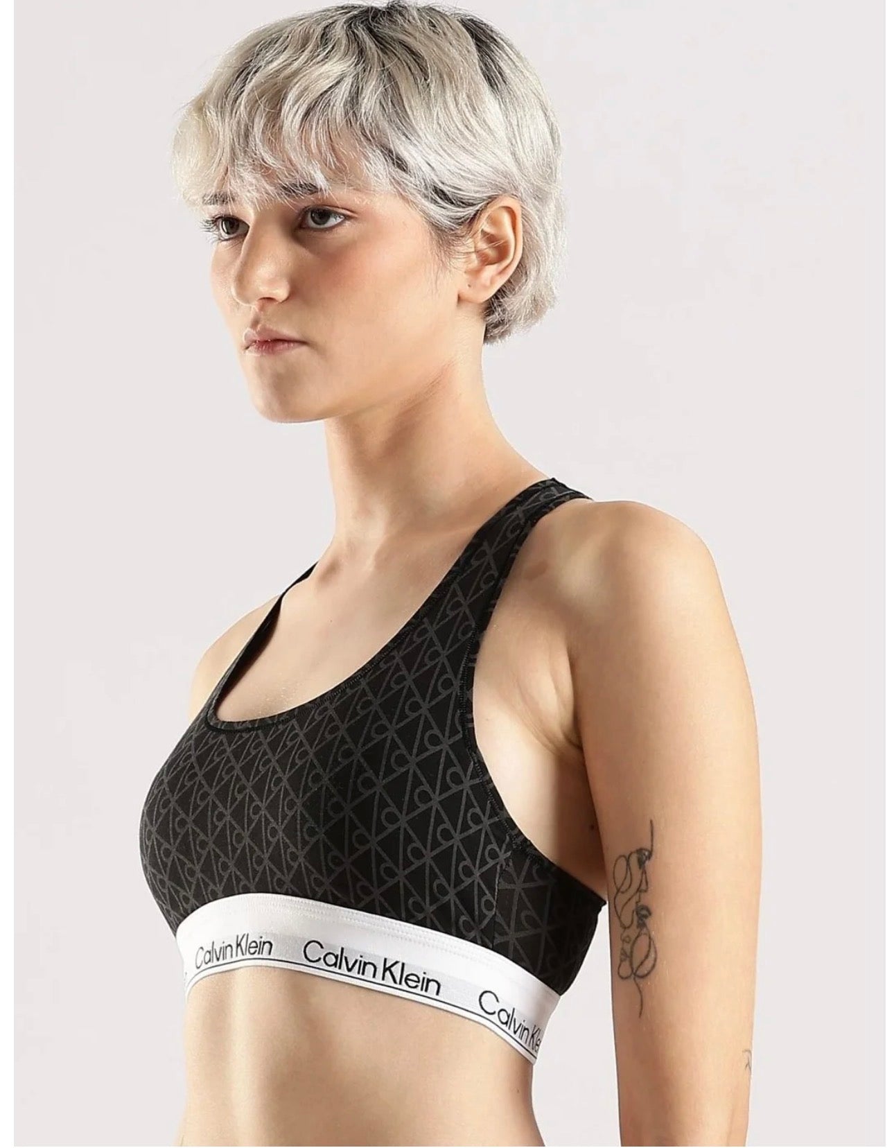 Calvin Klein CK One All-Over Logo Sports Bra – Black